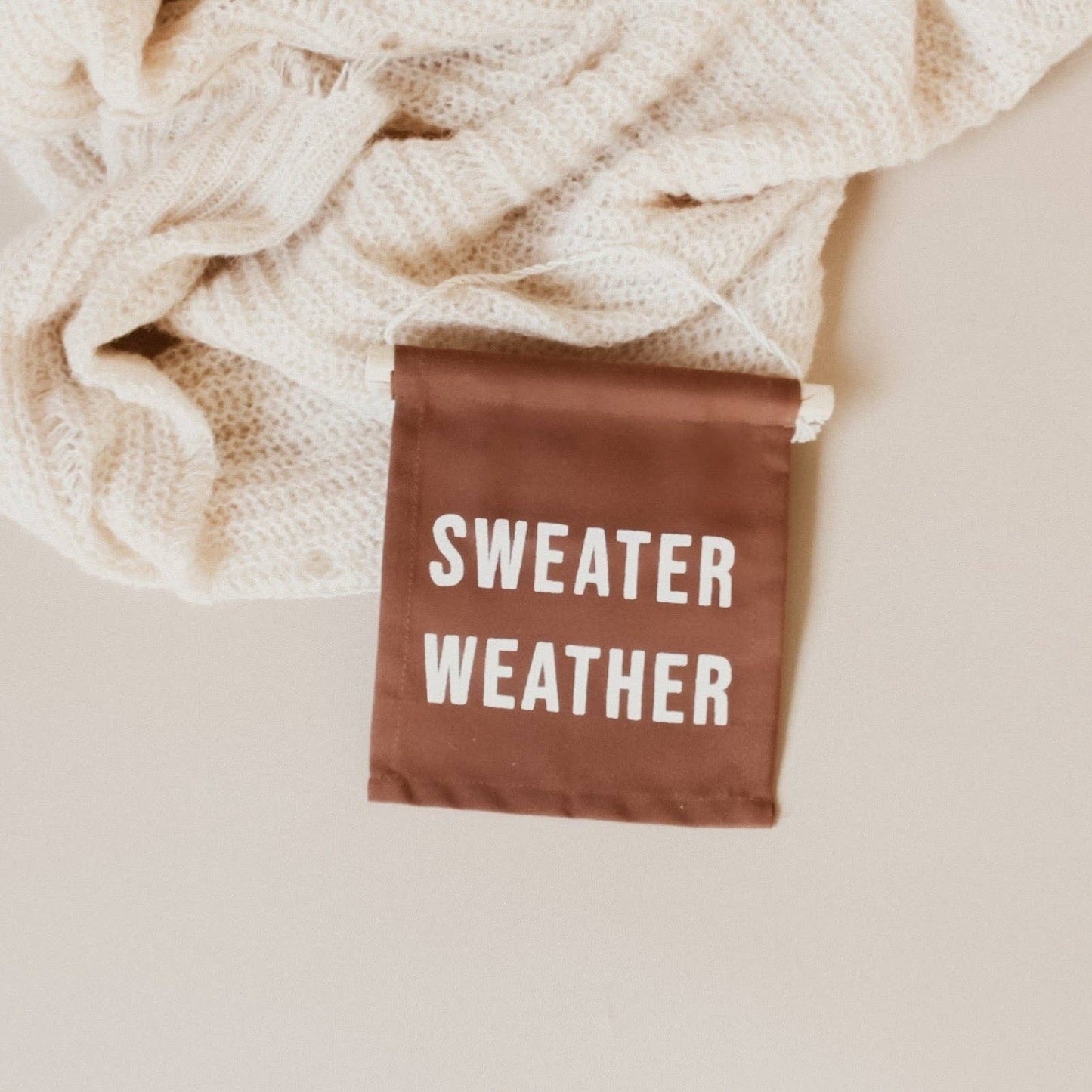 Sweater weather hang sign